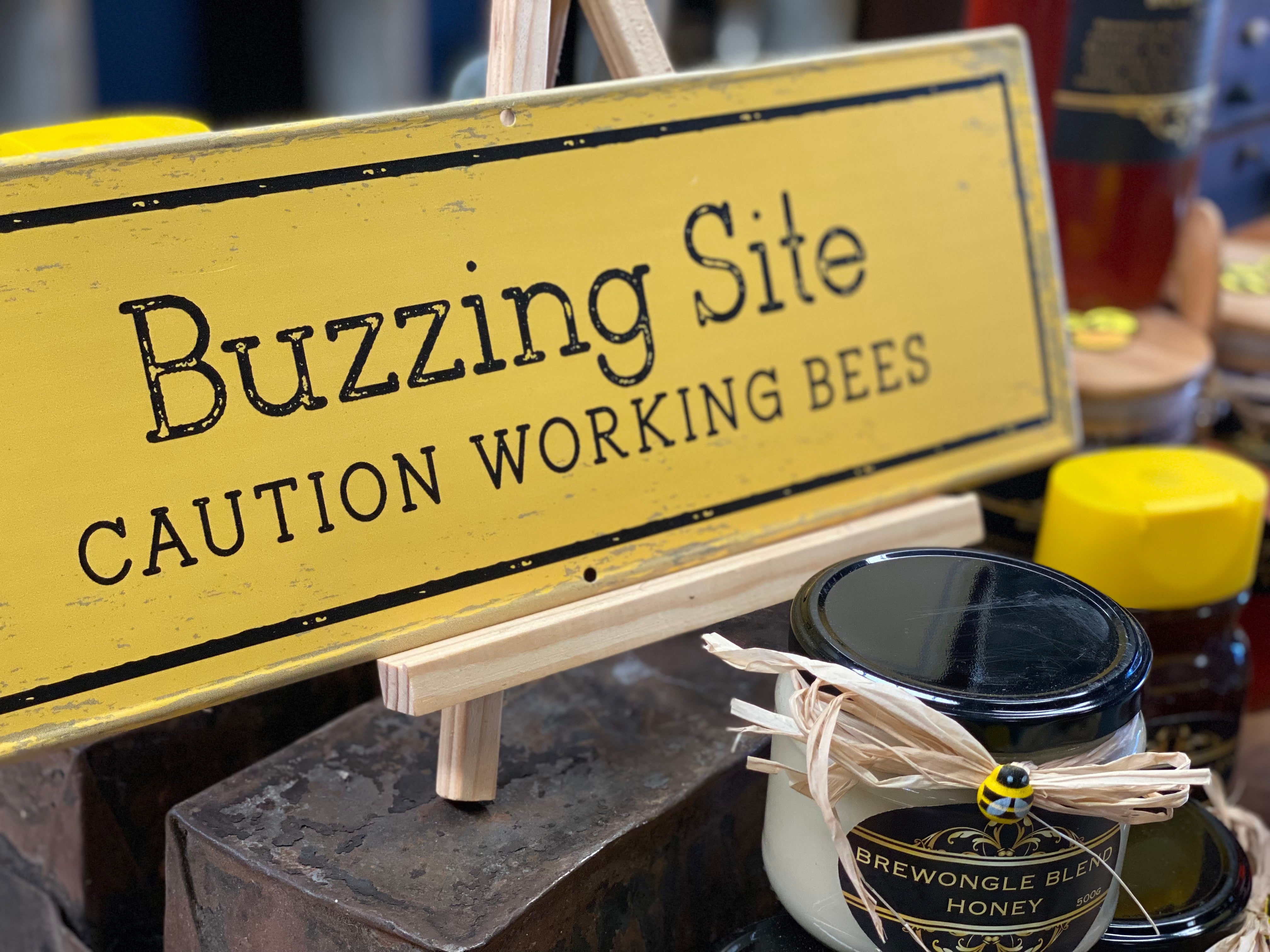 BUZZING Site Tin Sign