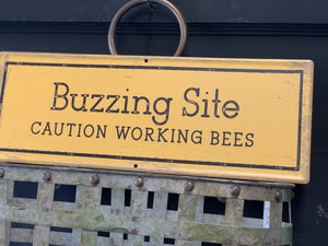 BUZZING Site Tin Sign