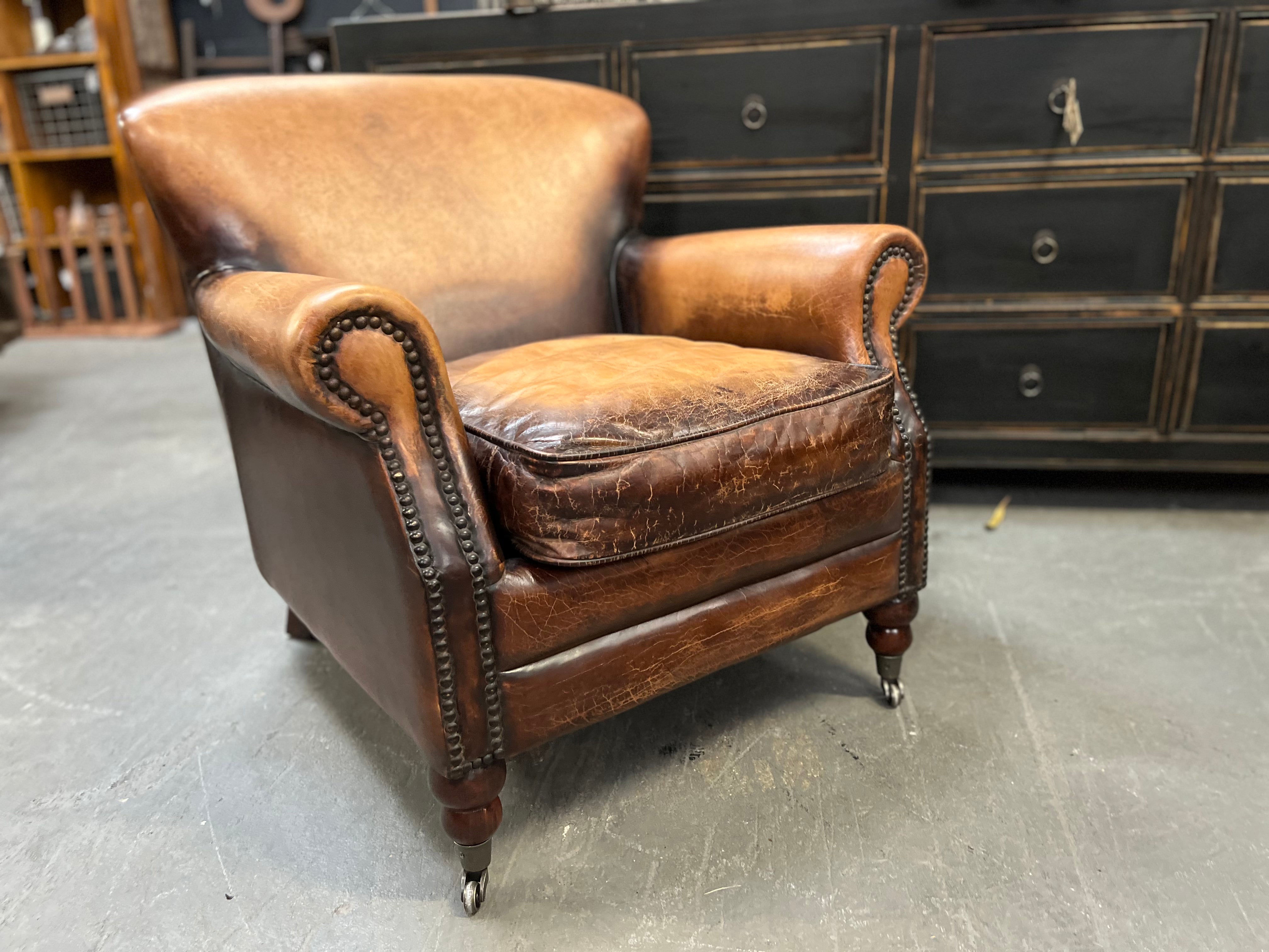 The NORMAN aged Leather Chair