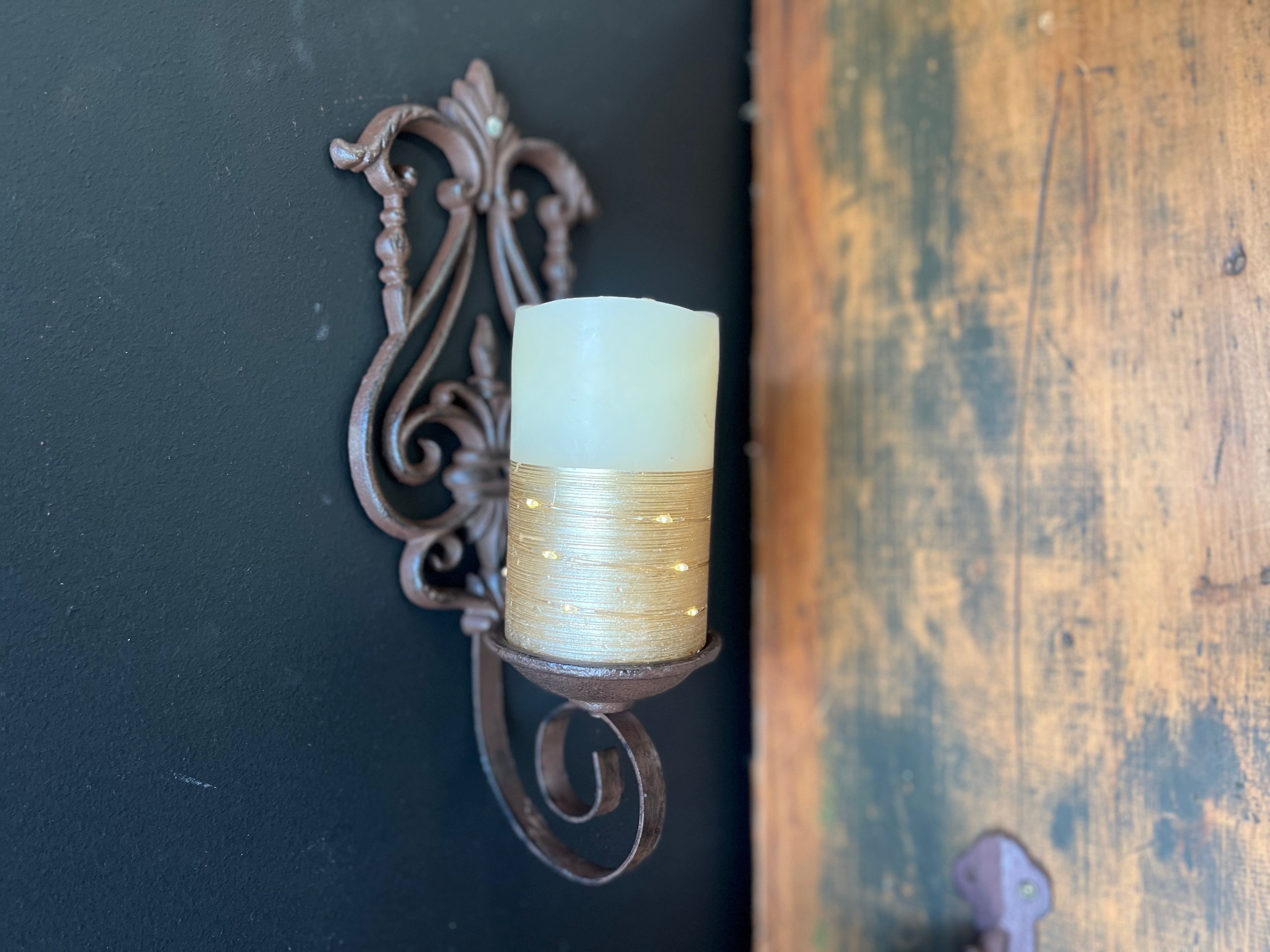 Outdoor wall candle deals holder